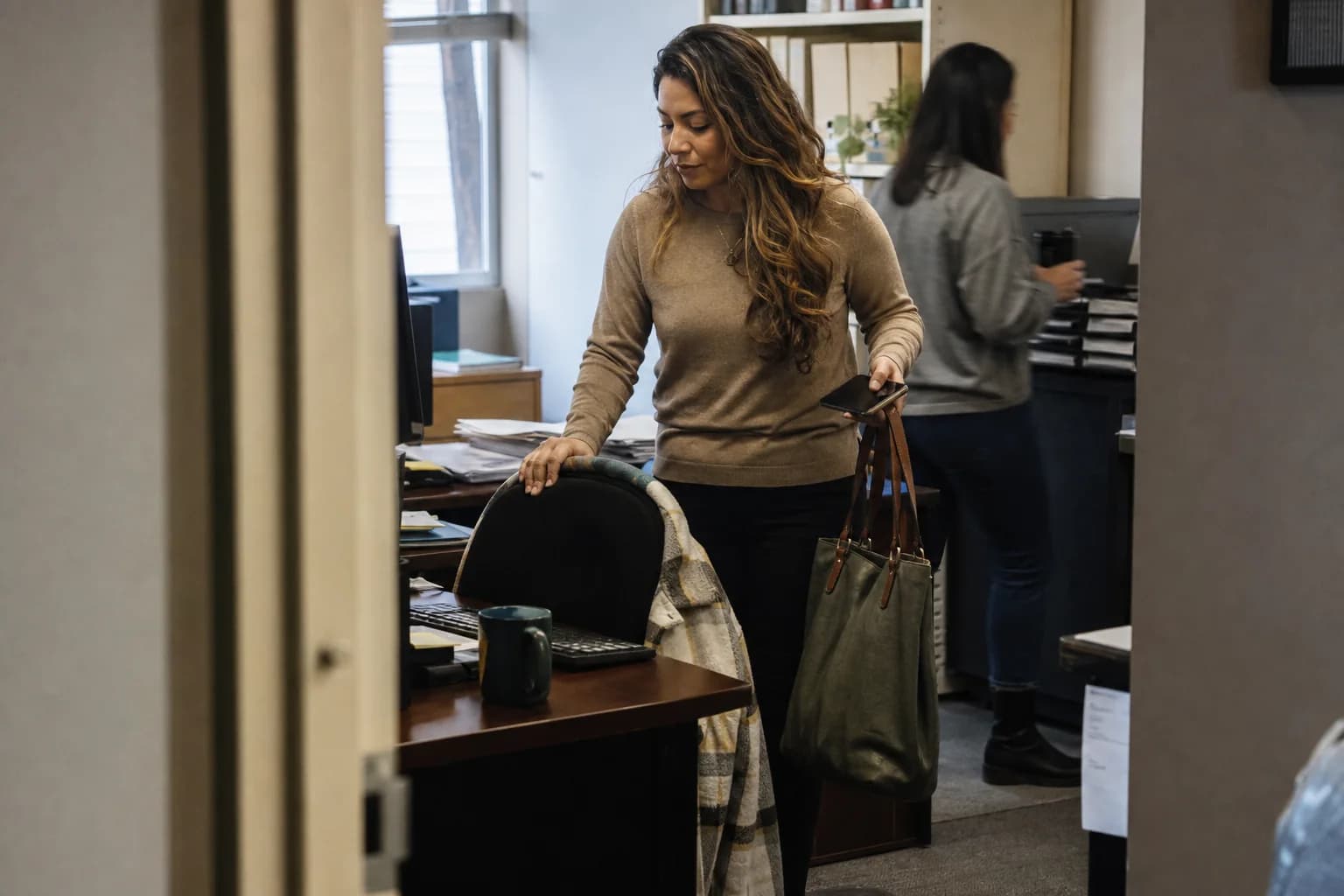 Employees begin the morning in a small accounting and tax office